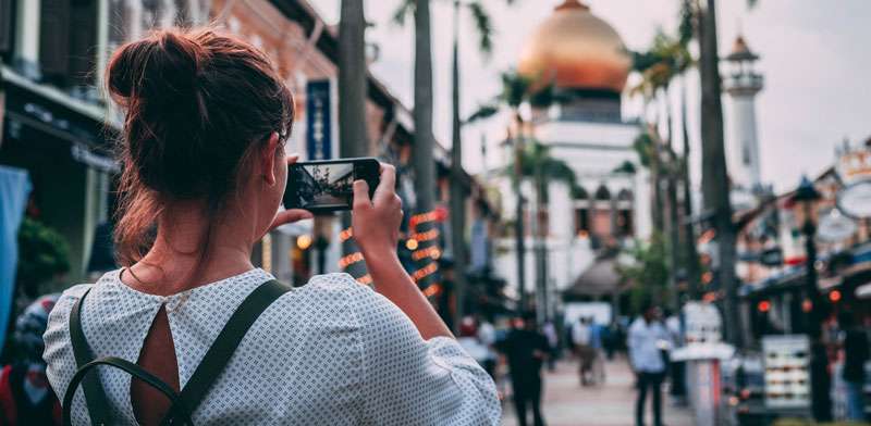 woman taking pictures