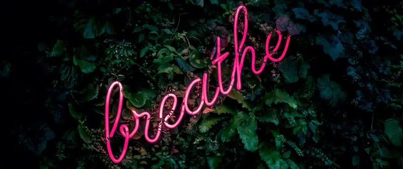 word breathe in neon letters