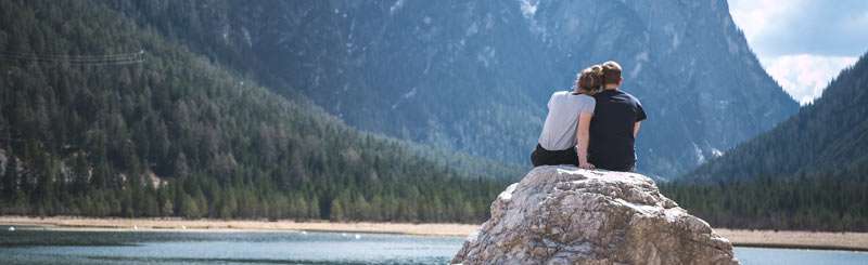 couple outside on a rock