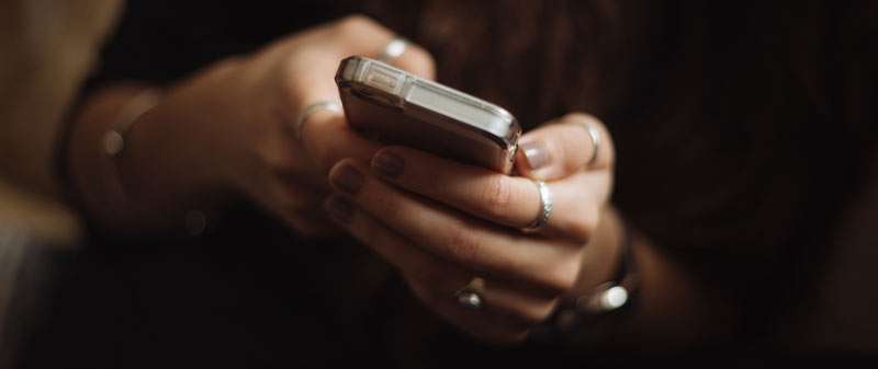 hands holding a mobile phone