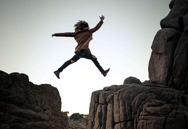 woman jumping without a safety net