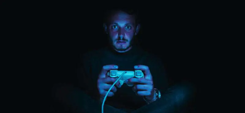 man addicted to video games