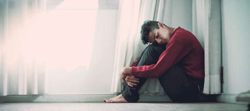 man feeling depressed