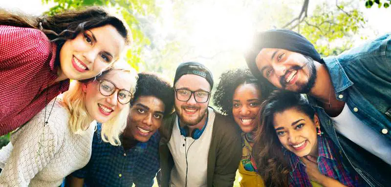 people of different ethnic backgrounds smiling