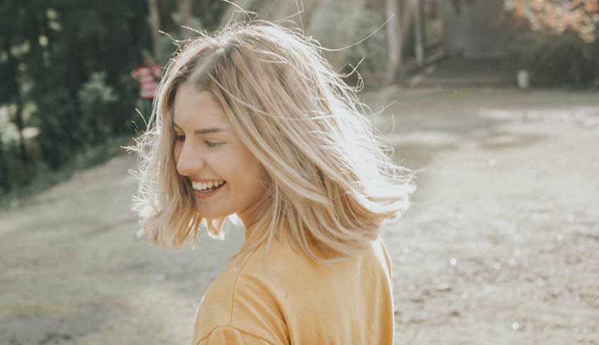 woman feeling happy and smiling