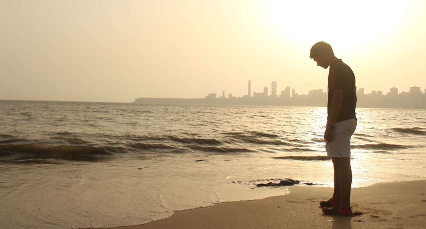 insecure man looking at the shore