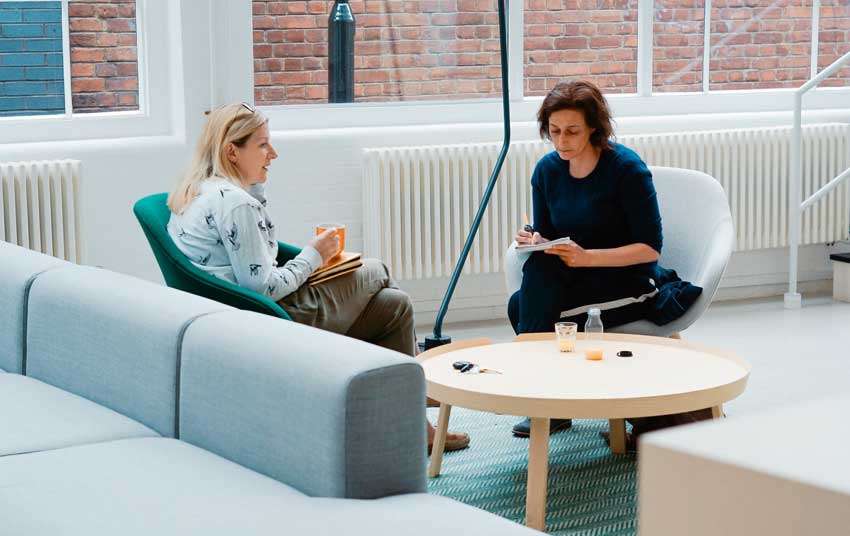 woman listening to a feedback