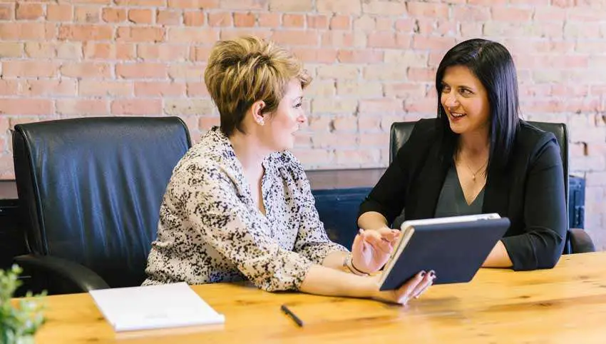 2 women in a workplace